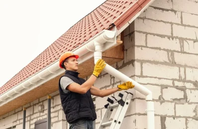 Pose et remplacement de gouttières aux Touches